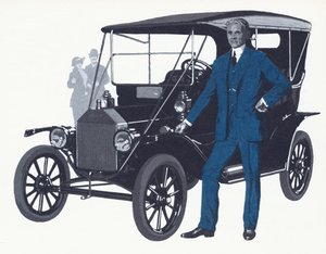 Henry Ford com o famoso modelo T que fez o nome e a fortuna da Ford de English School
